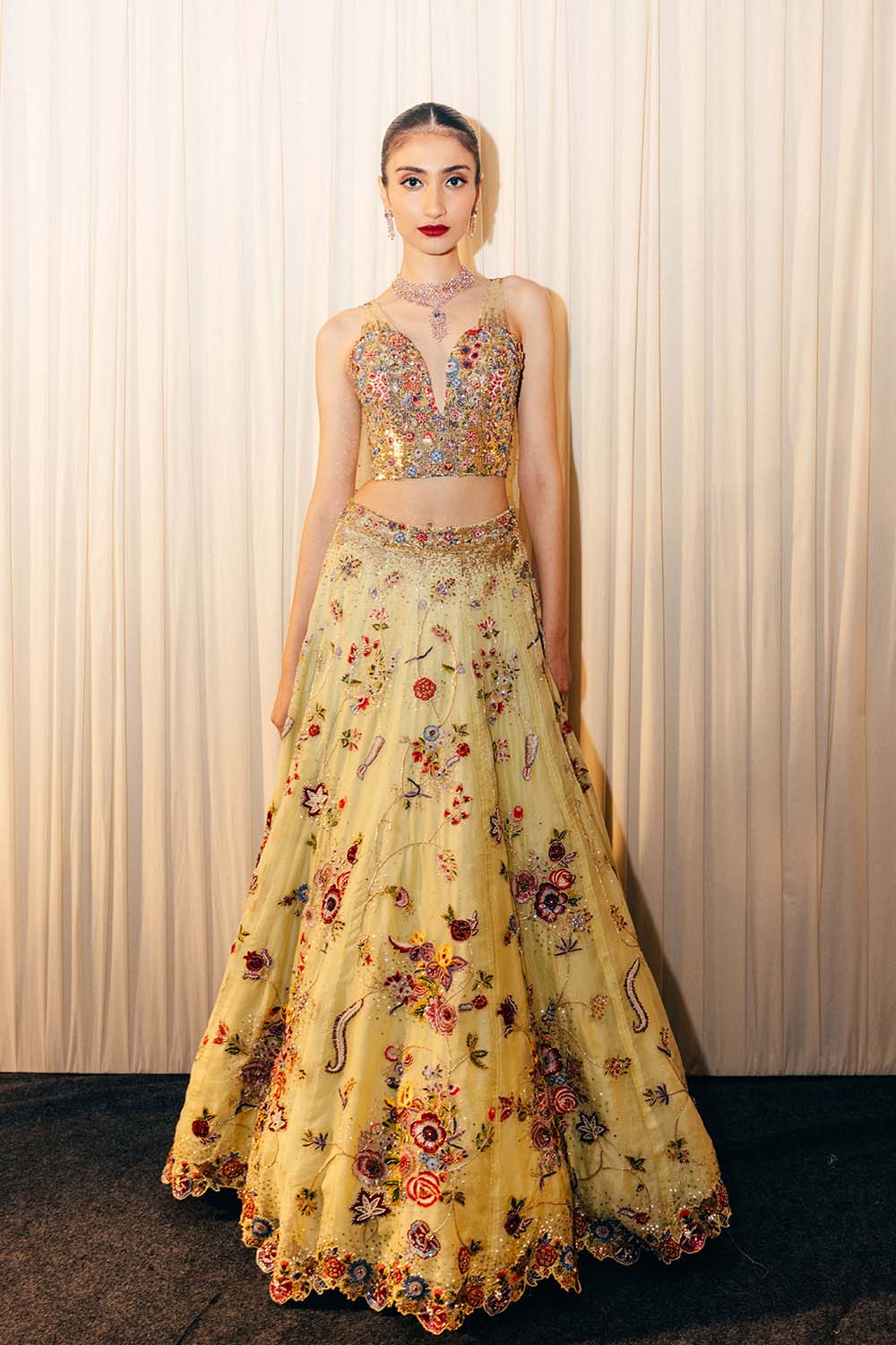 Anar Bel Silk Organza Lehenga with Hand-Embroidered Corset with Trail in Coral and Lime