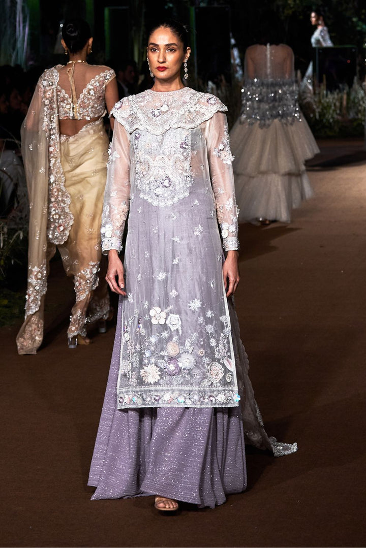 Khwabida Silk Organza Kurta with Sequinence Bralette, Lattice Cape, and Classic Hand-Embroidered Trousers in Ivory and Lavender