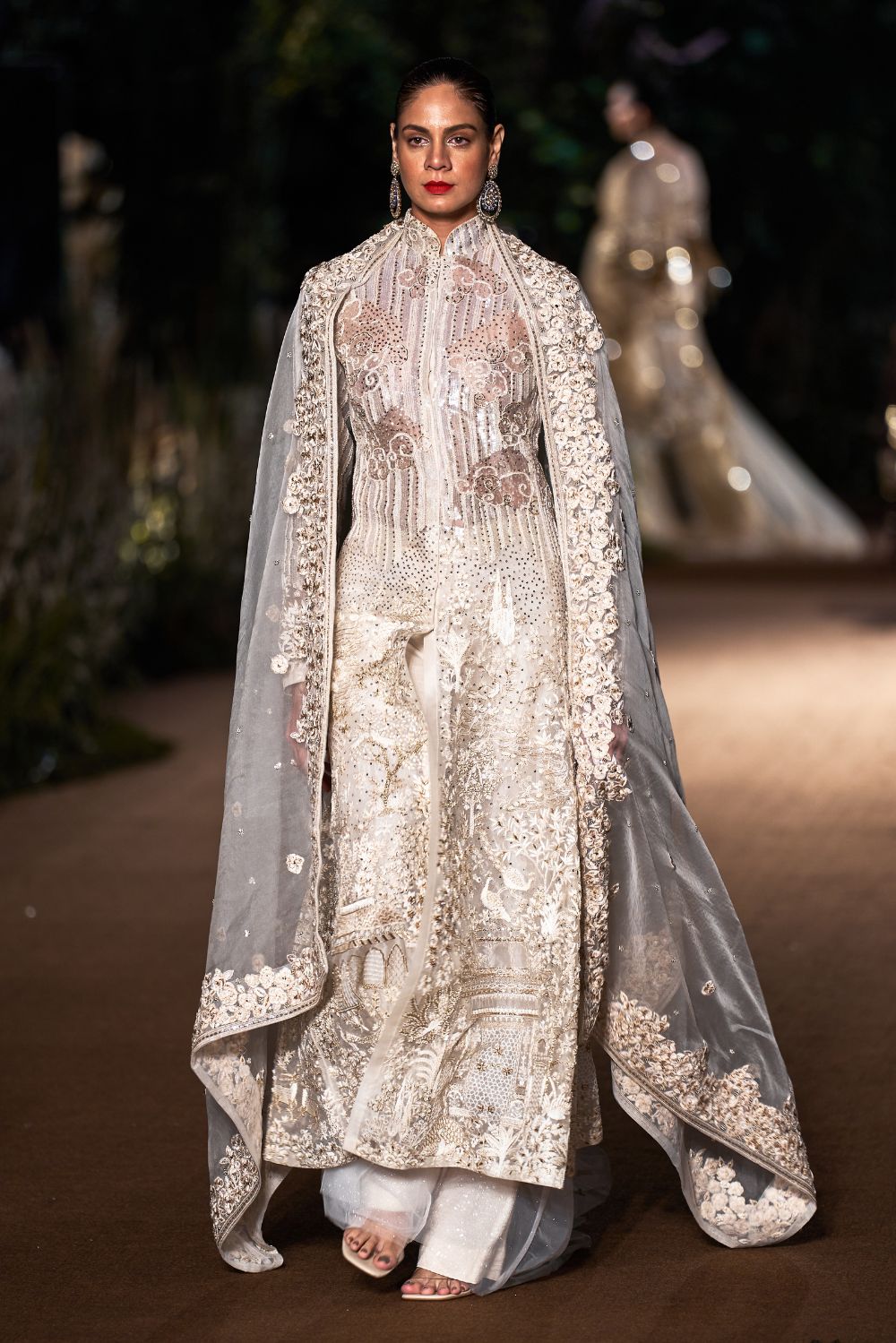 Navbhumi Silk Organza Kurta with Sequinence Hand-Sequinned Trousers and Rainbow Dupatta in Ivory, Gold, and Nude