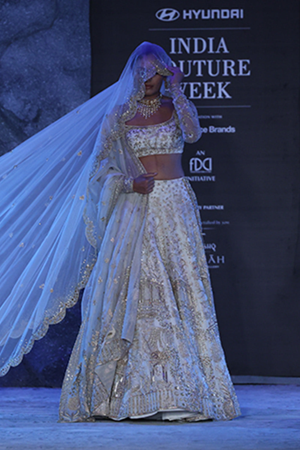 Jharokha Tonal Hand-Embroidered Lehenga Set with Blouse, Dupatta &amp; Veil in Ivory