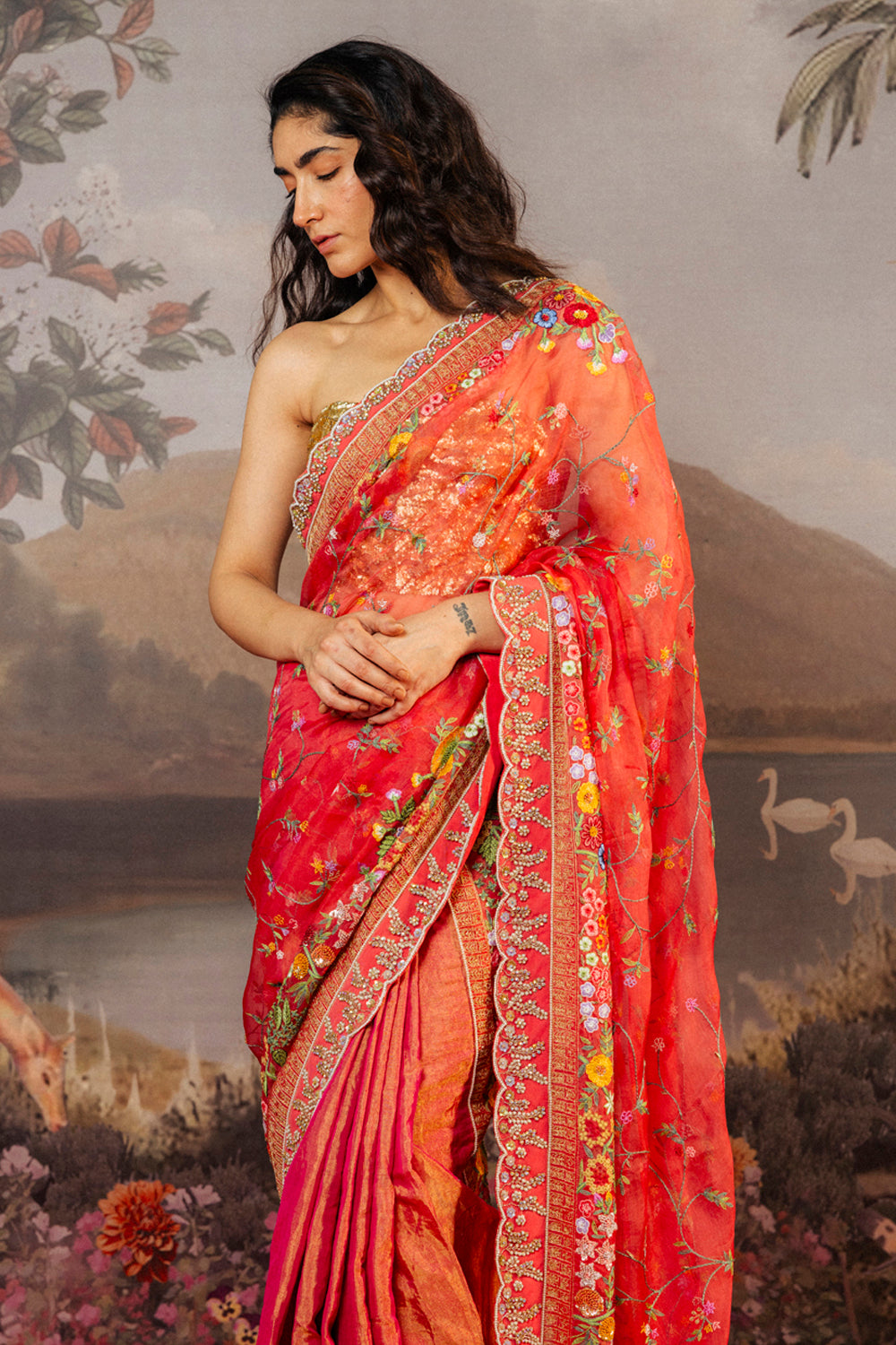 Leaf Textured Hand-Embroidered Blouse with Haveli Hand-Embroidered Saree in Gold and Coral