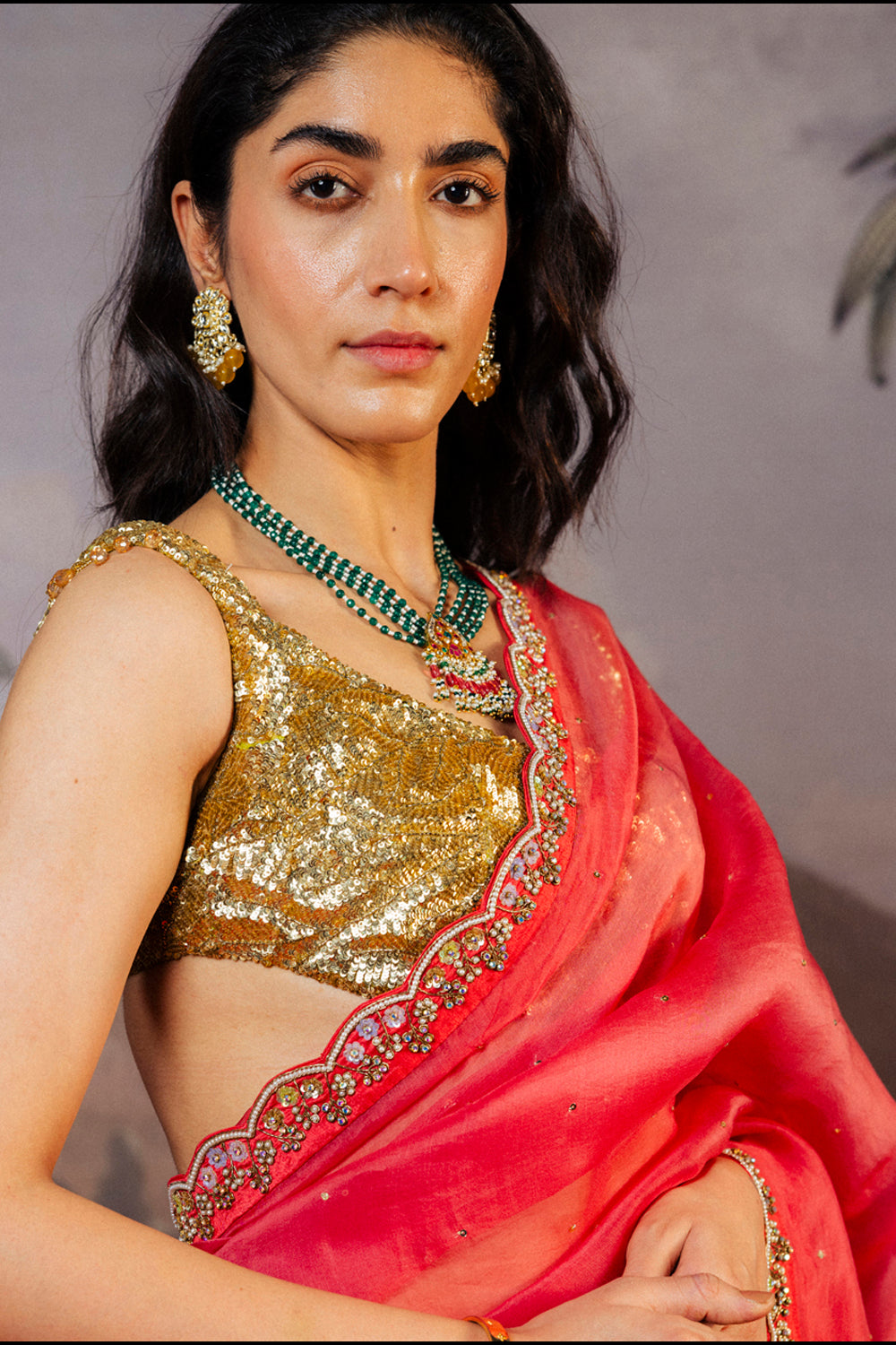 Leaf Textured Hand-Embroidered Blouse with Lotus Pound Hand-Embroidered Saree in Gold and Coral